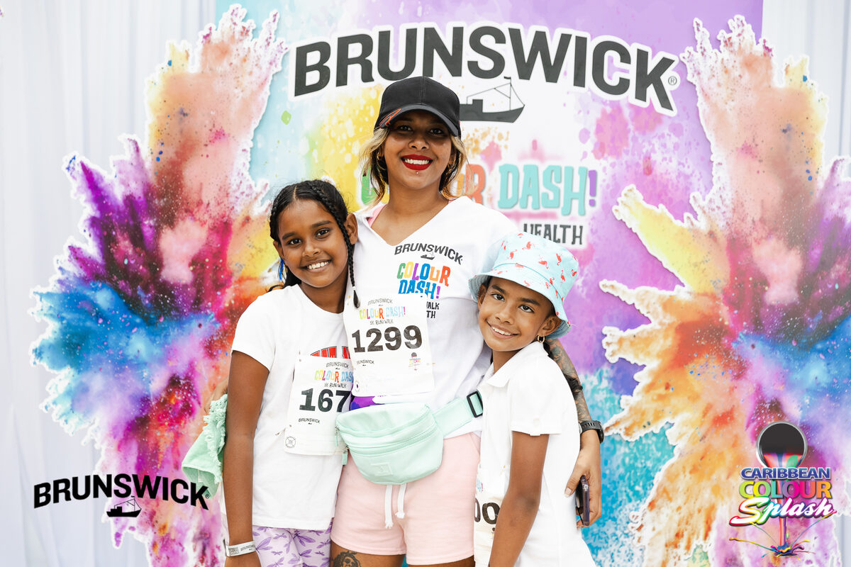 Brunswick Colour Dash participant celebrating